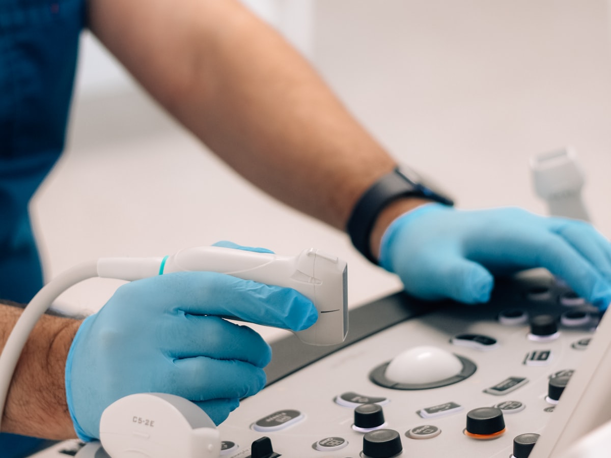 Technician using an ultrasound console